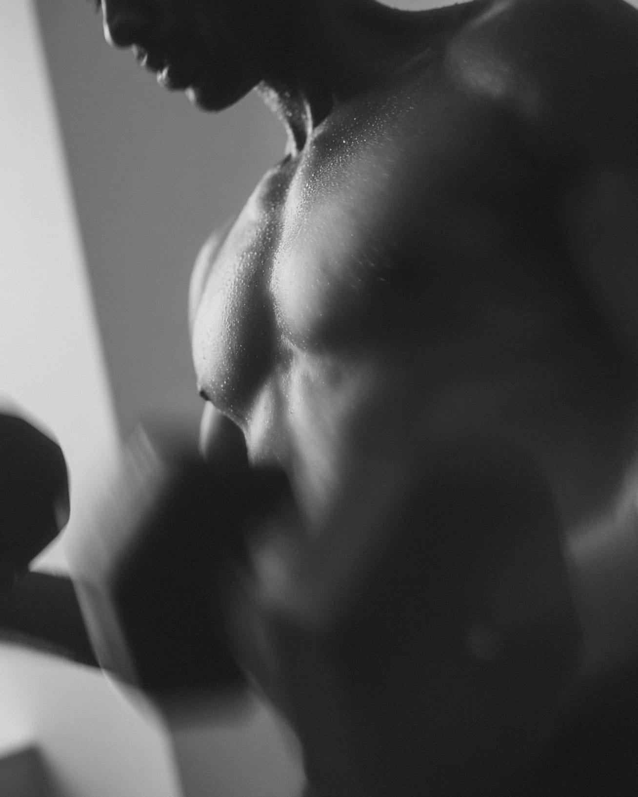 Athlete training at the gym — REVIVR electrolyte drink for strength and endurance